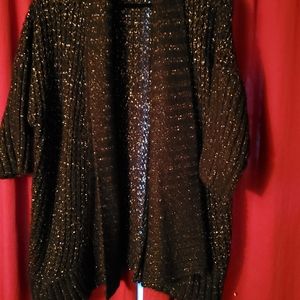 Black cardigan with silver glittery accents!